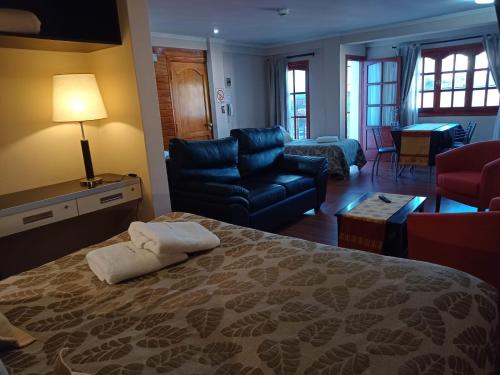 Χώρος καθιστικού στο Apart Hotel Cabo San Diego