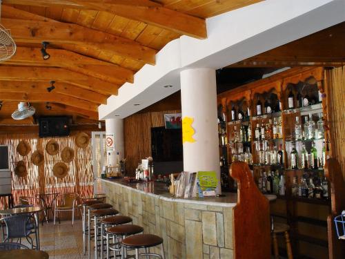 The lounge or bar area at Julias Apartments
