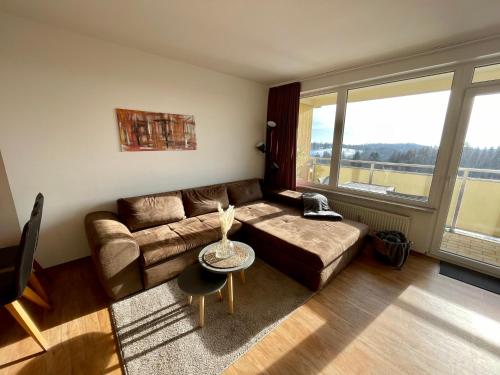 Χώρος καθιστικού στο Schöne Ferienwohnung mit Schwimmbad, Sauna und Balkon