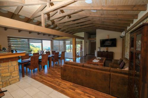 a living room with a couch and a table at Villa Sarajevo in Vareš