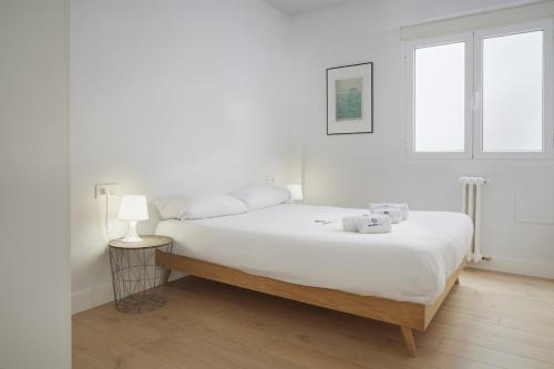 A bed or beds in a room at Aukera - Basque Stay