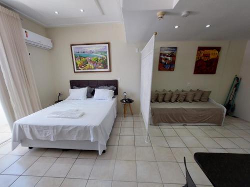 Una cama o camas en una habitación de Flat beira mar, Olinda 4 Rodas 315