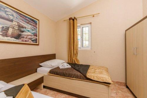 Monte Perla Residenceにあるベッド