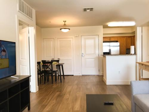 a living room with a kitchen and a dining room at Perfect Apt near UCLA w Parking Gym Pool WIFI in Westwood B3 in Los Angeles
