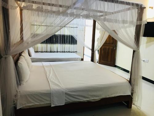 Ліжко або ліжка в номері Leisure Port Restinn