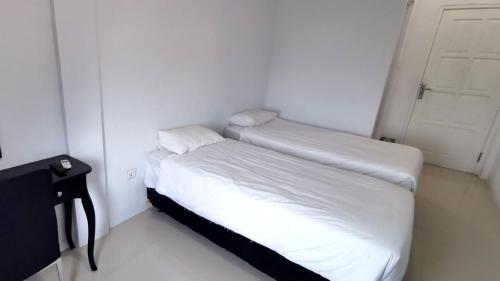 Кровать или кровати в номере Hotel Aqiilah Syariah