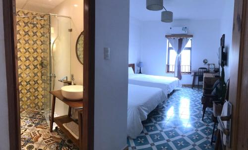 Giường trong phòng chung tại Hotel De Condor