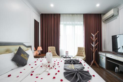 TV a/nebo společenská místnost v ubytování Wind Hotel