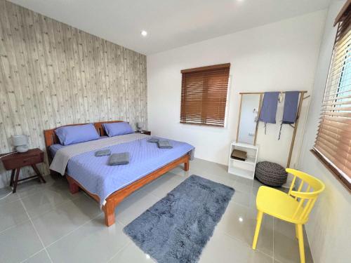 Ένα ή περισσότερα κρεβάτια σε δωμάτιο στο Homerent @ Sariam Lake Chiang Mai
