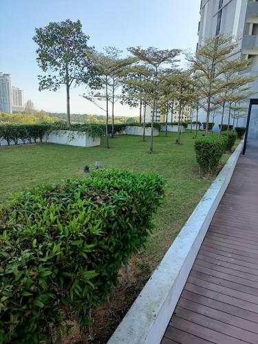 Κήπος έξω από το cozy seaview 6 studio apartment
