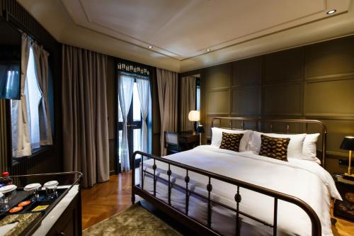 Кровать или кровати в номере Hotel Verdigris