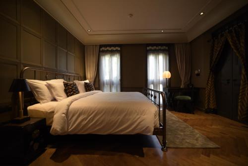 Ein Bett oder Betten in einem Zimmer der Unterkunft Hotel Verdigris