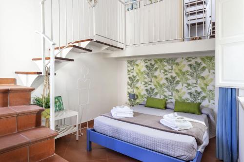 A bed or beds in a room at Salomone Apartments II by Wonderful Italy