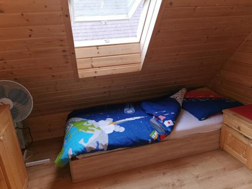 Katil atau katil-katil dalam bilik di Domki Borowiackie nad brzegiem jeziora