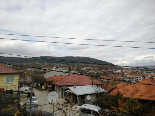 a view of a town with houses and roofs at дом Тодор и Тота Мутевски in Troyan