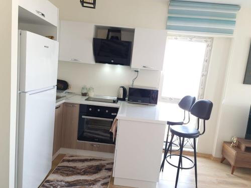 Kuchyň nebo kuchyňský kout v ubytování King Suite WH32