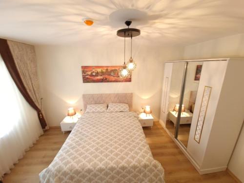 Postel nebo postele na pokoji v ubytování King Suite WH32