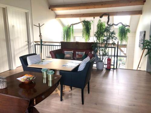 Khu vực ghế ngồi tại B&B Het Nijenhuis