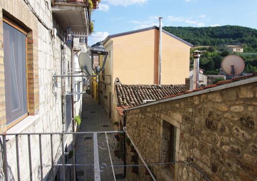 an alleyway between two buildings in a town at Il Casale del Borgo in Cancellara