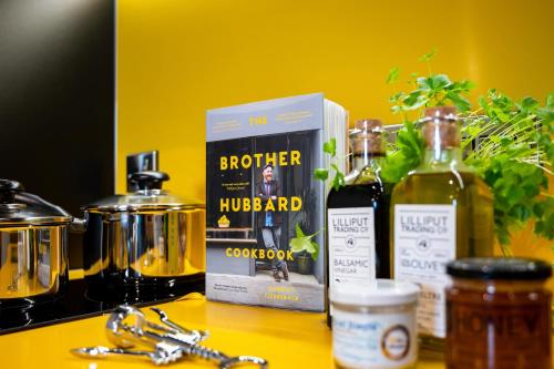a counter with a box of alcohol and other ingredients at Staycity Aparthotels Dublin Tivoli in Dublin