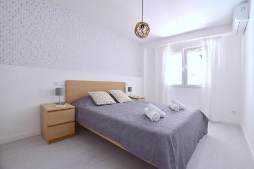 Emma Apartment Centralにあるベッド