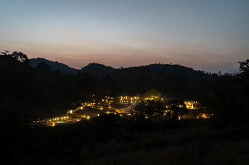 a view of a town at night at Turban Nature Wilderness , Kumbhalgarh in Kumbhalgarh