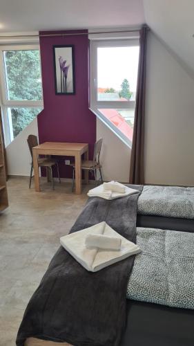 Ένα ή περισσότερα κρεβάτια σε δωμάτιο στο U8 apartmanház