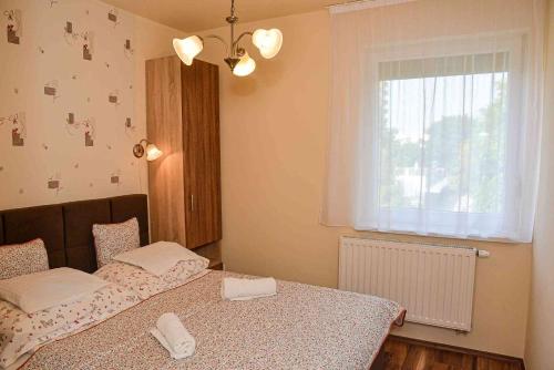 Katil atau katil-katil dalam bilik di Apartman Ottó