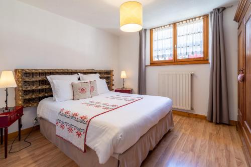 Katil atau katil-katil dalam bilik di Les Suites - La Cour St Fulrad