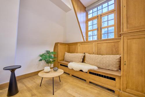 Et opholdsområde på Maison Grand Place 2BR 3