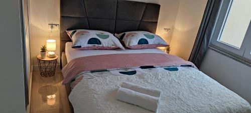 Postel nebo postele na pokoji v ubytování Apartman Hajdi