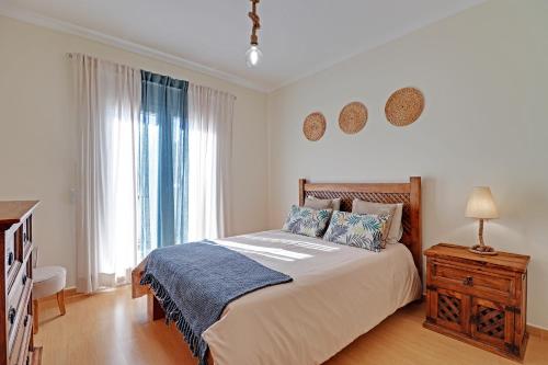 En eller flere senge i et værelse på Burgau Charming House Villa