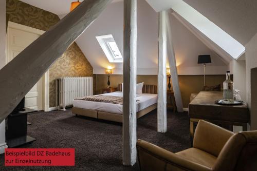 Voodi või voodid majutusasutuse Hotel & Restaurant Villa Ulmenhof toas