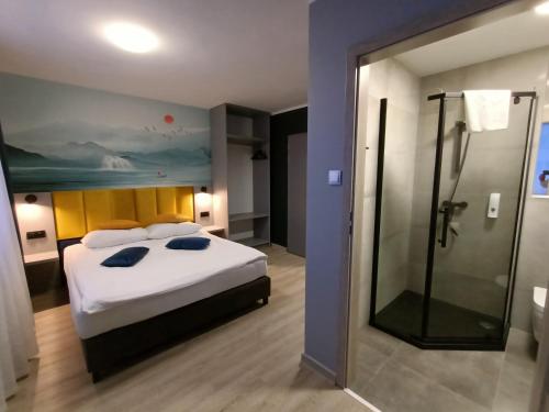 Ένα ή περισσότερα κρεβάτια σε δωμάτιο στο Hotel Pomorski