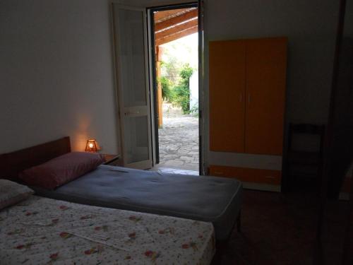 Ένα ή περισσότερα κρεβάτια σε δωμάτιο στο Agriturismo Specchiarussa