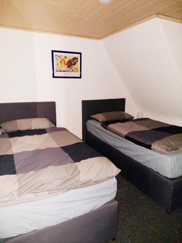 Katil atau katil-katil dalam bilik di Ferienwohnung Haske mit Wallbox