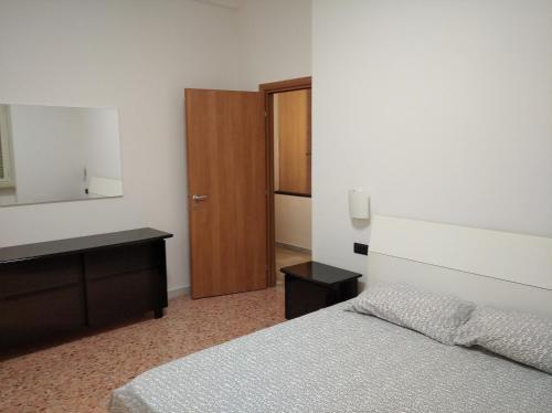 A bed or beds in a room at Roma - Talenti