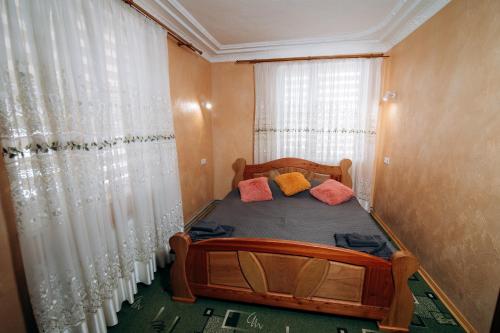 Postel nebo postele na pokoji v ubytování Садиба Федорчуків Гірська хатина 1