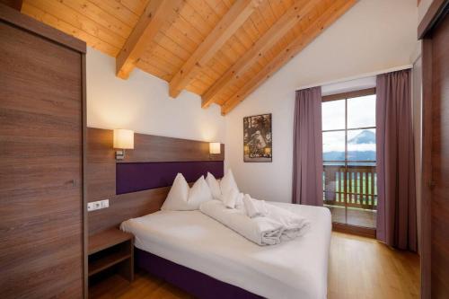 Postel nebo postele na pokoji v ubytování Aigenberg Appartements
