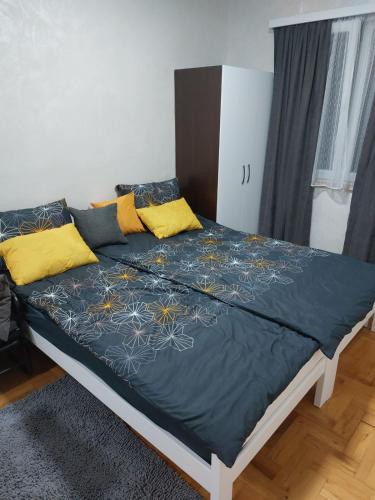 Postel nebo postele na pokoji v ubytování Apartman Obadovic