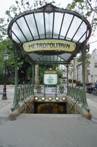a sign for a metroorenhibition in a city at ibis Paris Porte de Montreuil in Paris