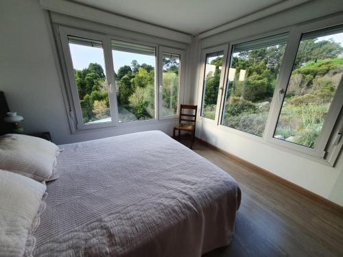 Ένα ή περισσότερα κρεβάτια σε δωμάτιο στο Casa La Pedrera