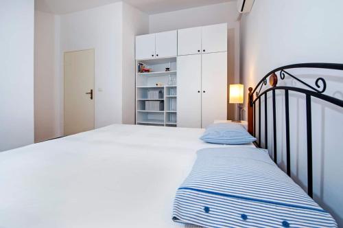 Posteľ alebo postele v izbe v ubytovaní Rovinj view Apartment