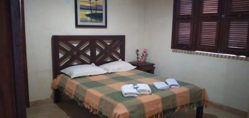 Кровать или кровати в номере Casa de veraneio