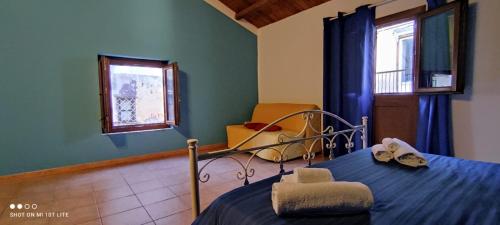 A bed or beds in a room at Casa Samu