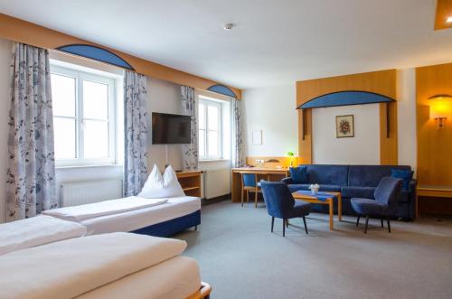 Posteľ alebo postele v izbe v ubytovaní Hotel Goldenes Schiff