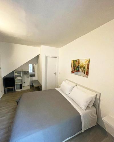 a bedroom with a large bed in a room at Corte San Gaetano in Bari