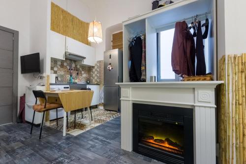 A television and/or entertainment centre at Social - kitchen home - apartment Madrid