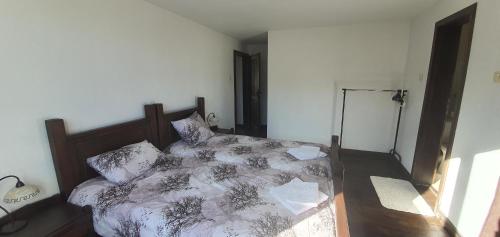 Кровать или кровати в номере Guest House Ela