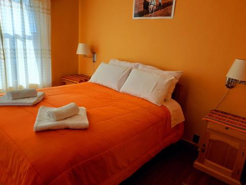 Ein Bett oder Betten in einem Zimmer der Unterkunft Wara Uta Lodge